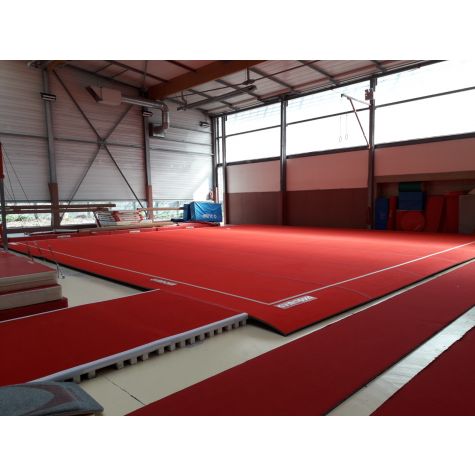 PRATICABLE "PISTES ENROULABLES" - 14 x 14 m